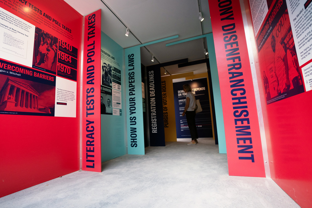 The inside of a mini exhibit with information about voter disenfranchisement. 